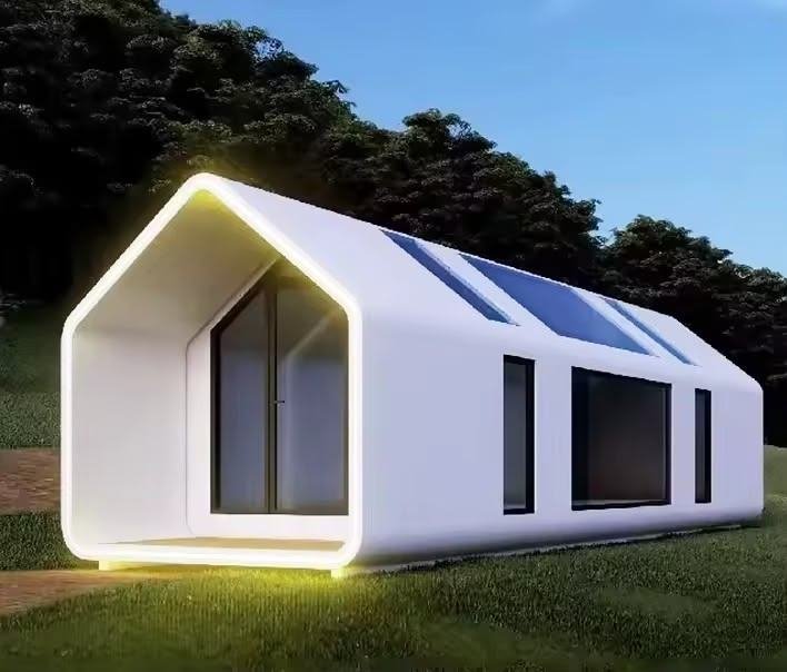 Illuminated capsule pod at night